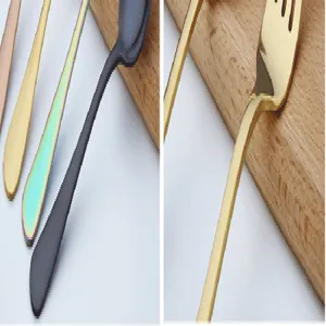 Stainless steel cutlery set detail featuring multi-color forks, knives, and spoons.