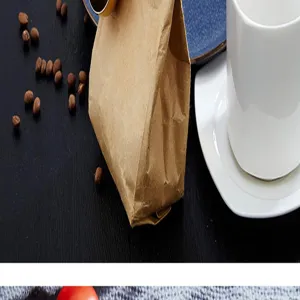 Stainless steel coffee spoon with sealing clip, convenient two-in-one measuring scoop.