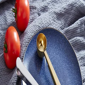 Stainless steel coffee scoop with bag sealing clip detail view, practical kitchen baking tool.