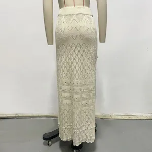 Falda maxi de punto beige calada, pareo de playa sexy con abertura alta y tejido elegante.