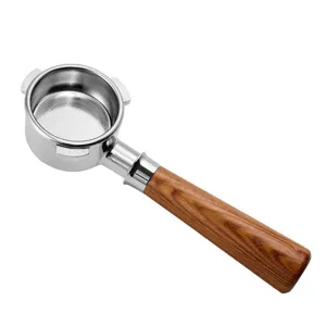 Stainless steel coffee machine portafilter with wooden handle for espresso brewing.