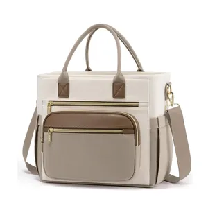Colorblock insulated lunch tote bag with wide opening, shoulder strap, and multi pockets.