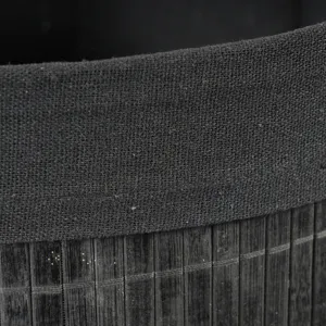 Black bamboo storage basket detail view texture close up fabric rim basket view