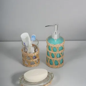 Natural woven glass bathroom accessory set dispenser tumbler and soap dish home decor.