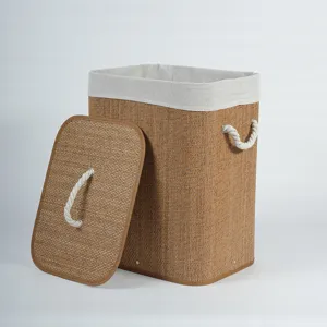 Detailed view of bamboo woven laundry basket with lid and white rope handles. Durable storage.