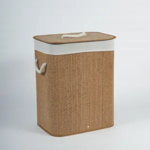 Handmade bamboo woven laundry hamper with lid and rope handles for home organization storage.