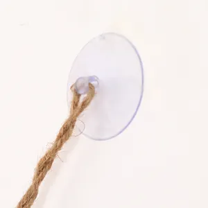 Detail shot of suction cup and hemp rope hanging accessory for reptile pet hammock setup.