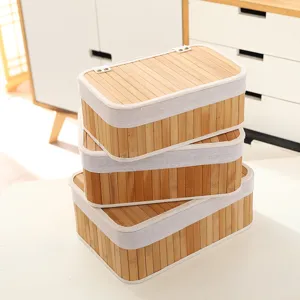 Boîte de rangement en bambou avec couvercle, organisateur de bureau empilable chic.