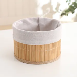 Natural bamboo woven storage basket with fabric lining detail shot for desktop organization.