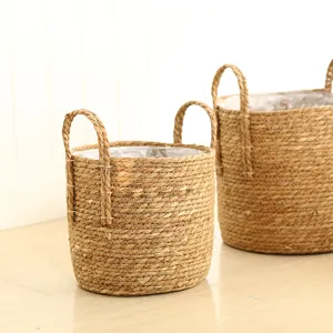 Nordic straw woven storage basket, natural seagrass flower pot with handles for home decor.