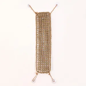 Detail view of the natural seagrass woven reptile mat, featuring sturdy mesh and suction cups.