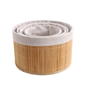 Natural bamboo storage basket set, nested round organizer bucket with fabric lining for home.