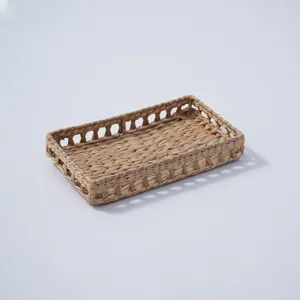 Handmade woven storage basket detail showing the intricate straw texture and openwork rim design.