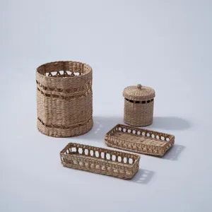 Woven straw storage basket detail set, natural handmade desktop organizer for home and office.