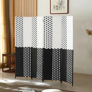 Detailed view of the Chinese style black and white woven folding room divider in a home setting.