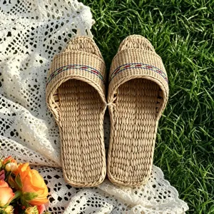 Hand-woven straw slippers, breathable indoor flat summer sandals with colorful woven details.