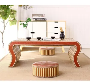 Traditional bamboo woven tatami low table scene detail, classic tea desk setup.