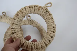 Handmade corn husk braided hot pot mat detail close up natural plant woven trivet pad
