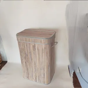 Bamboo laundry basket with lid and handles, ideal for bedroom, bathroom and home organization.