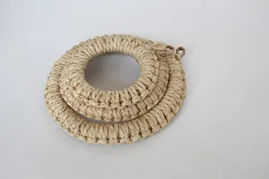Natural woven corn husk hot pad, round heat insulated placemat kitchen table decor.