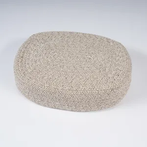 Detailed view of the oval cotton rope woven storage basket, showing fine texture and sturdy build.