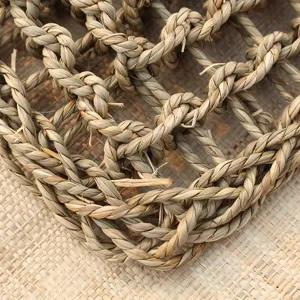 Natural straw woven pet mat detail, durable cat scratching pad and breathable resting pet bed.