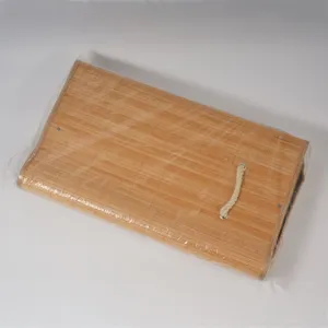 Bamboo woven storage basket detail, natural eco-friendly material with rope handle.