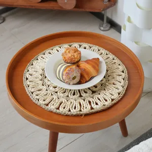 Round straw woven placemat, natural handmade table mat, rustic decor for kitchen and dining.