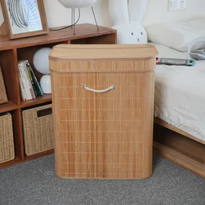 Bamboo woven laundry hamper with lid, sturdy storage basket for bedroom, living room organization.