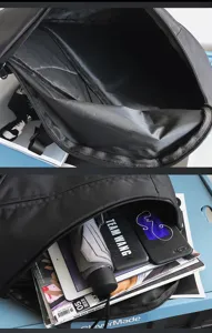 Detail view of the black cross-body chest bag showcasing large capacity interior storage.