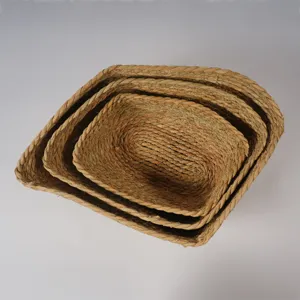 Cesta de almacenamiento de pasto marino tejida a mano, vista detallada del juego de cestas.