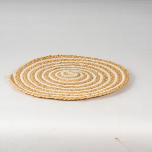 Round woven placemat, handmade raffia and cotton rope heat insulation table mat for home use.