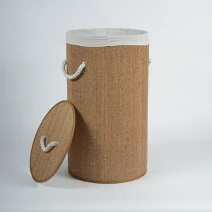 Details of the round bamboo woven laundry hamper with lid and fabric liner for home storage.