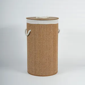 Round bamboo laundry basket with lid and rope handles, perfect for home storage and organization.