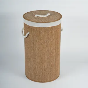 Round bamboo laundry basket with lid and rope handles, detailed view of woven storage hamper.