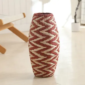 Handwoven straw vase minimalist boho style natural plant fiber decorative flower holder detail