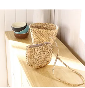 Handmade woven straw storage bag detail view showcasing natural seagrass material design