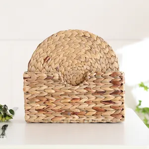 Natural woven placemat set with storage holder, rustic round straw table mat for home dining decor.
