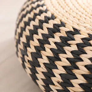 Handmade straw pouf floor cushion, woven tatami meditation mat for balcony and room decor.