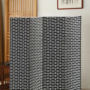 Black and white brick pattern folding screen detail view, modern minimalist home room divider.
