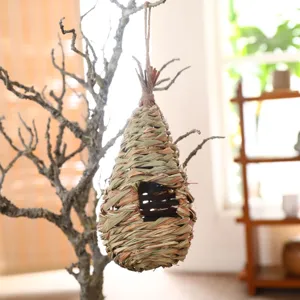 Handwoven straw bird nest hanging pet birdhouse natural grass breeding shelter for garden decor