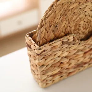 Woven placemat storage basket detail showcasing natural straw texture and neat handmade weave.