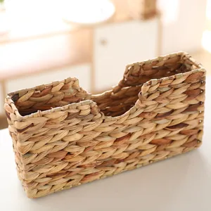 Close-up of natural woven straw storage basket detail, perfect for organizing placemats.