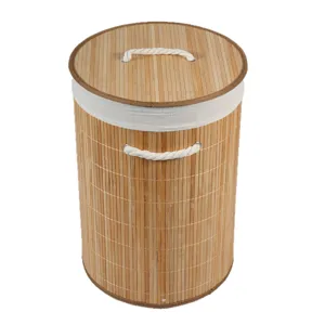 Nordic bamboo woven laundry hamper with lid and rope handles for bedroom and living room storage.