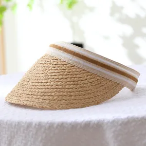Summer straw sun visor hat detail, woven empty top cap for outdoor beach UV protection.