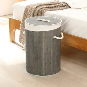 Panier à linge rond en bambou gris avec couvercle et poignées en corde pour la maison