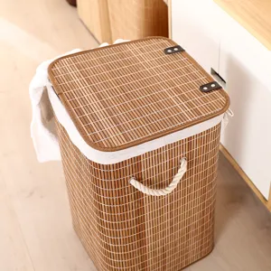 Foldable bamboo laundry hamper with lid and fabric liner, perfect for home clothes and toy storage.