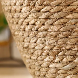 Close-up view displaying the natural woven texture and handcrafted details of the storage basket.