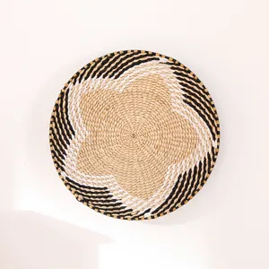 Handmade woven wall hanging basket decor, boho natural straw round wall art for living room.
