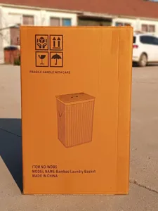 Bamboo laundry basket product packaging box showing model WDB5 details and features.